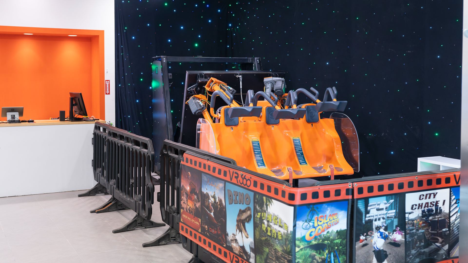 VR360 three-seat 360 degree motion simulator lit by starfield lighting